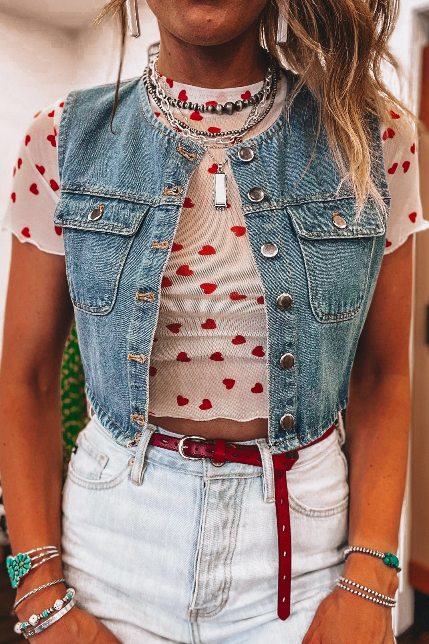 Pink mesh crop top with allover heart print and lettuce trim