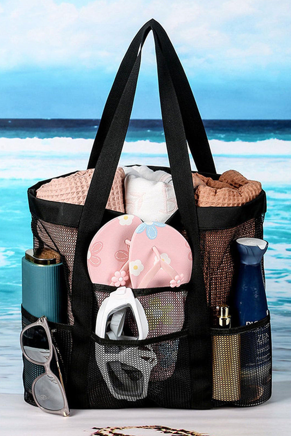 Black multi-pocket large mesh tote bag with sturdy handles for beach day essentials