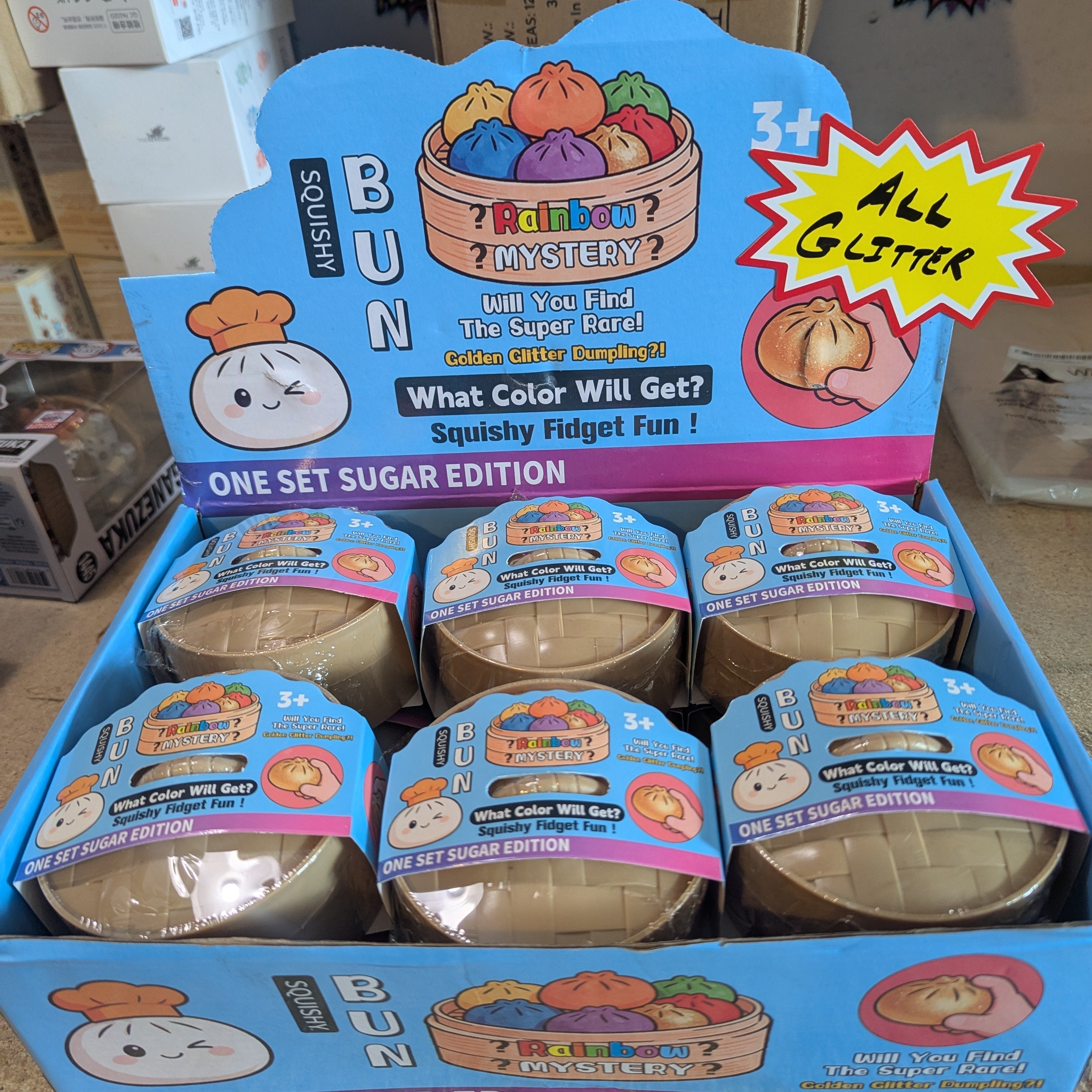 All Glitter Squishy Bun Mystery Dumplings with sparkly glitter and soft texture for sensory fun