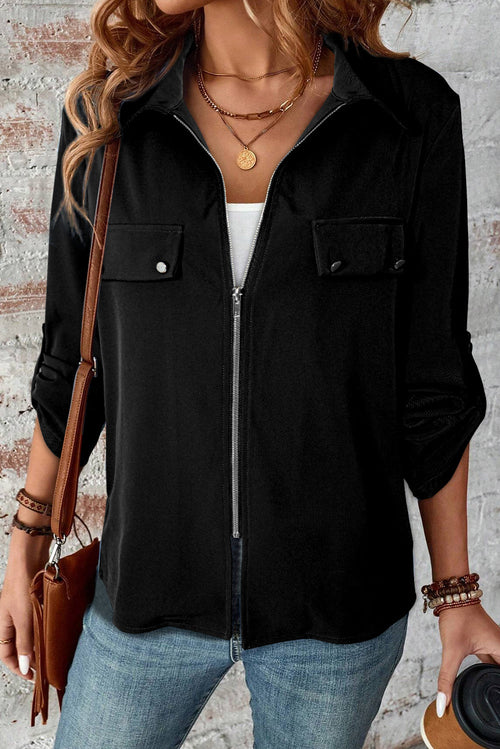 Black jacket with collar, tab sleeves, zip-up front, and flap detail