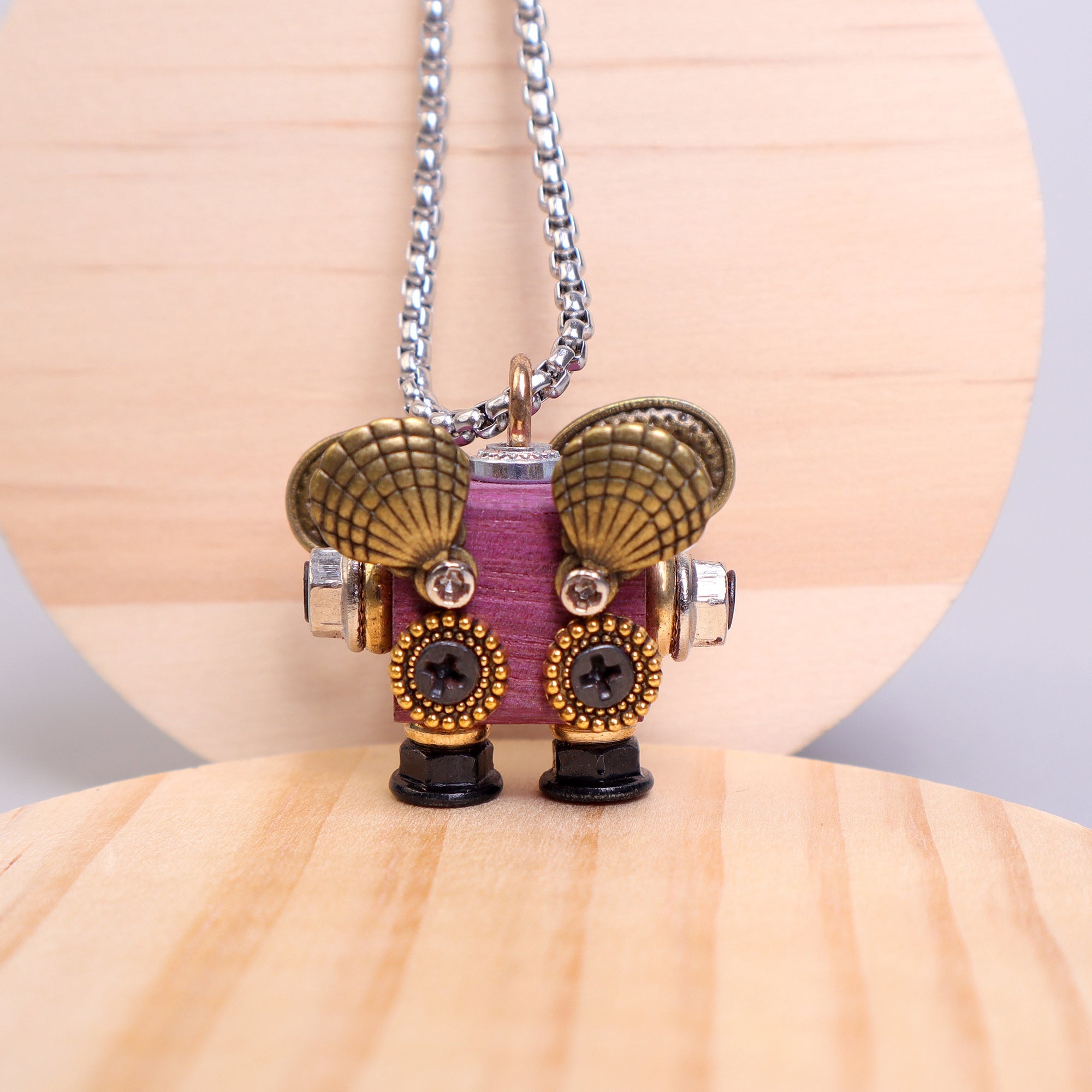 Handcrafted wooden bot necklace keychain and mini decor with unique character and natural wood texture