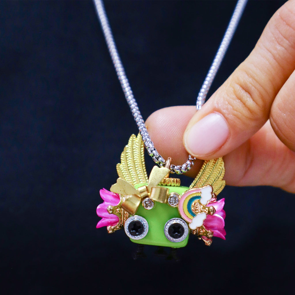 Handcrafted wooden bot necklace and keychain with unique character and natural wood texture