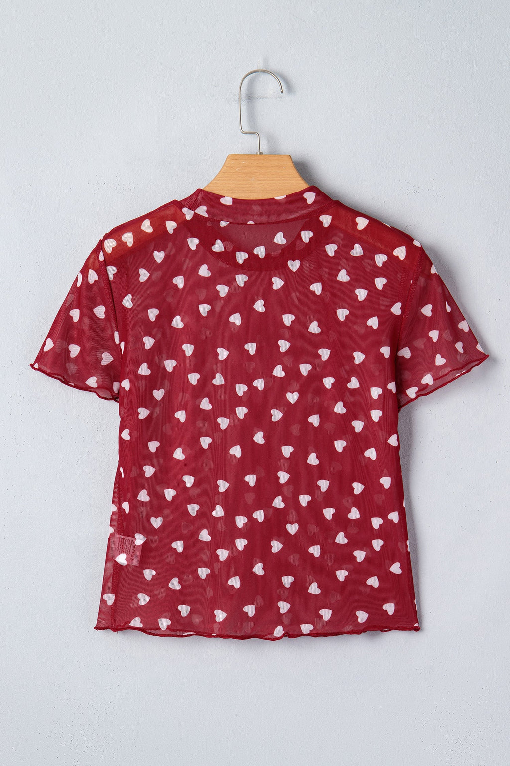 Pink mesh short sleeve crop top with allover heart print and lettuce trim neckline
