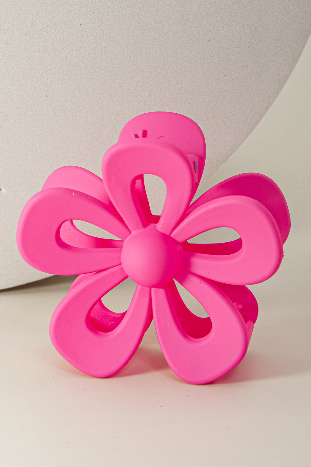 Black sweet hollowed flower shaped claw clip with frosting finish for hair styling