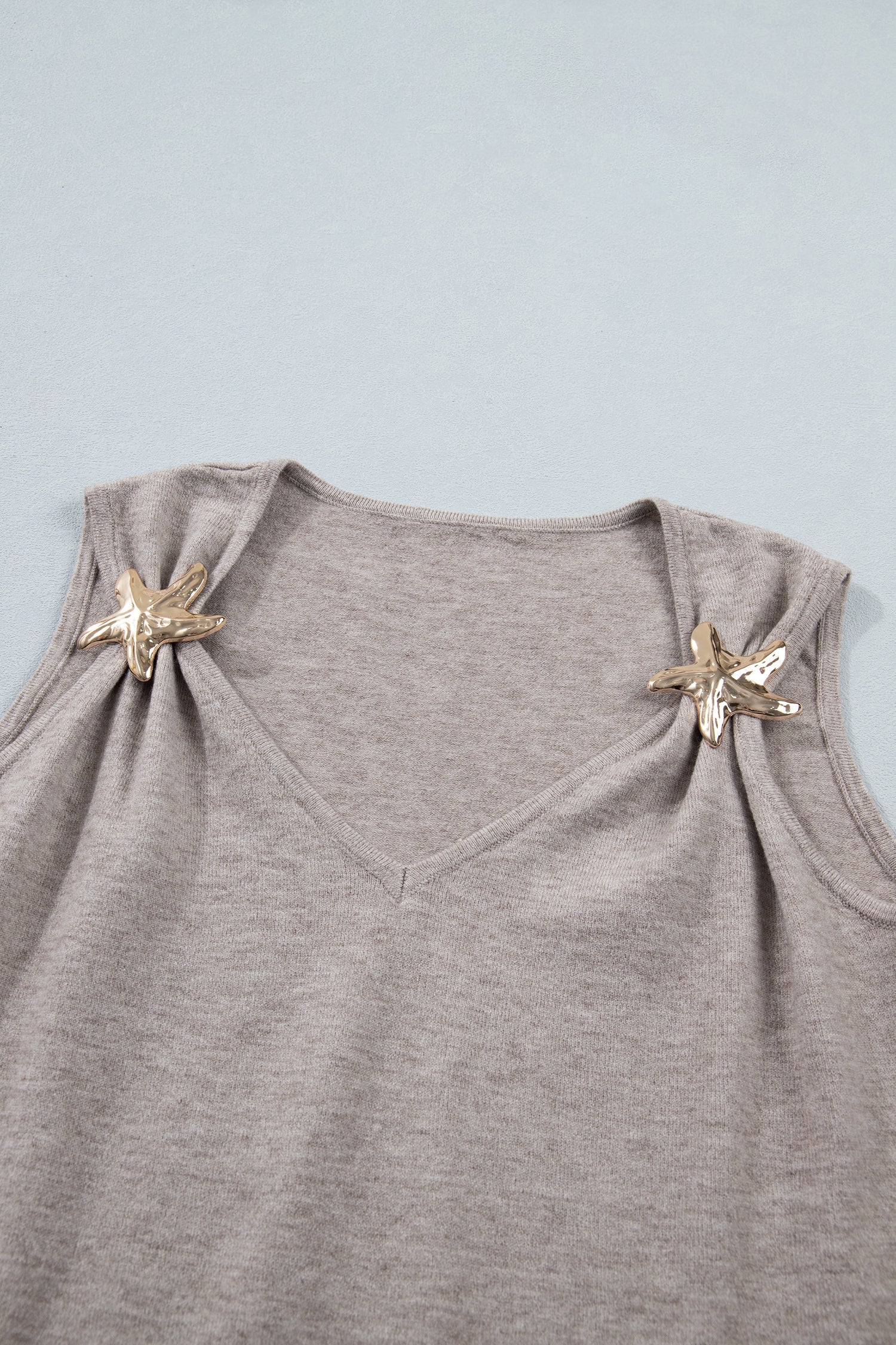 Gray Morn sleeveless V neck sweater tank top with metallic star detail and relaxed fit