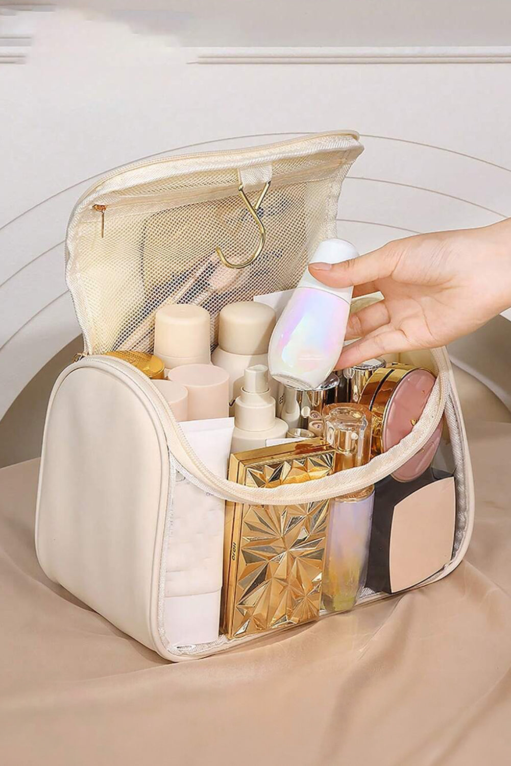 Beige clear makeup bag with TASTY print and handle, featuring inside pocket for storage