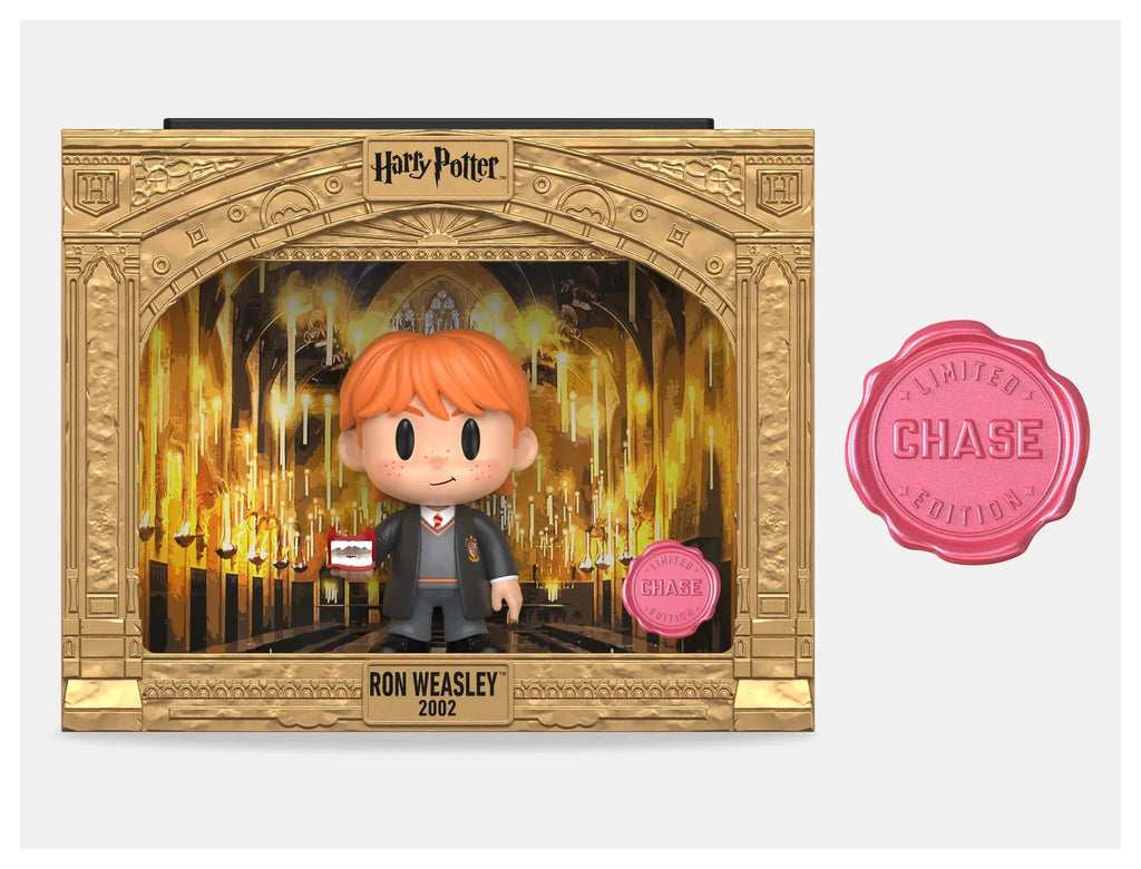 Ron Weasley PIX Classic Vinyl Figure in Gryffindor robes from Harry Potter and the Wizarding World mystery box with 1 in 6 chance at chase edition