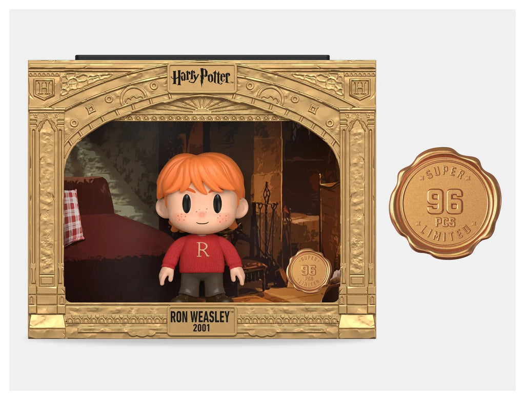 Ron Weasley PIX Classic Vinyl Figure in Gryffindor robes from Harry Potter and the Wizarding World with 1-in-6 chance chase edition