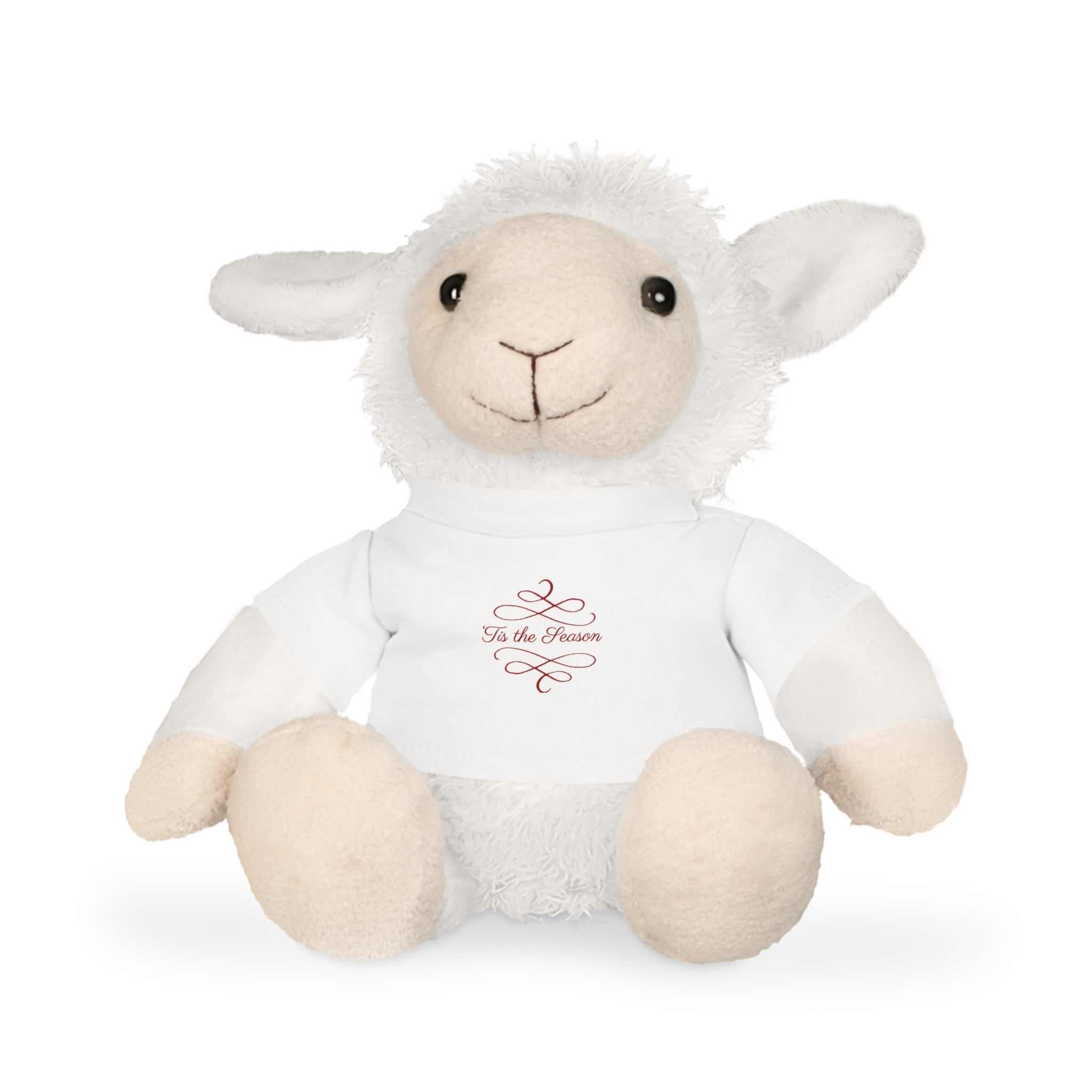 Soft white plush sheep wearing a white holiday T-shirt with "Tis the Season" text.