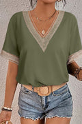 Green blouse with lace trim and V-neck short sleeves