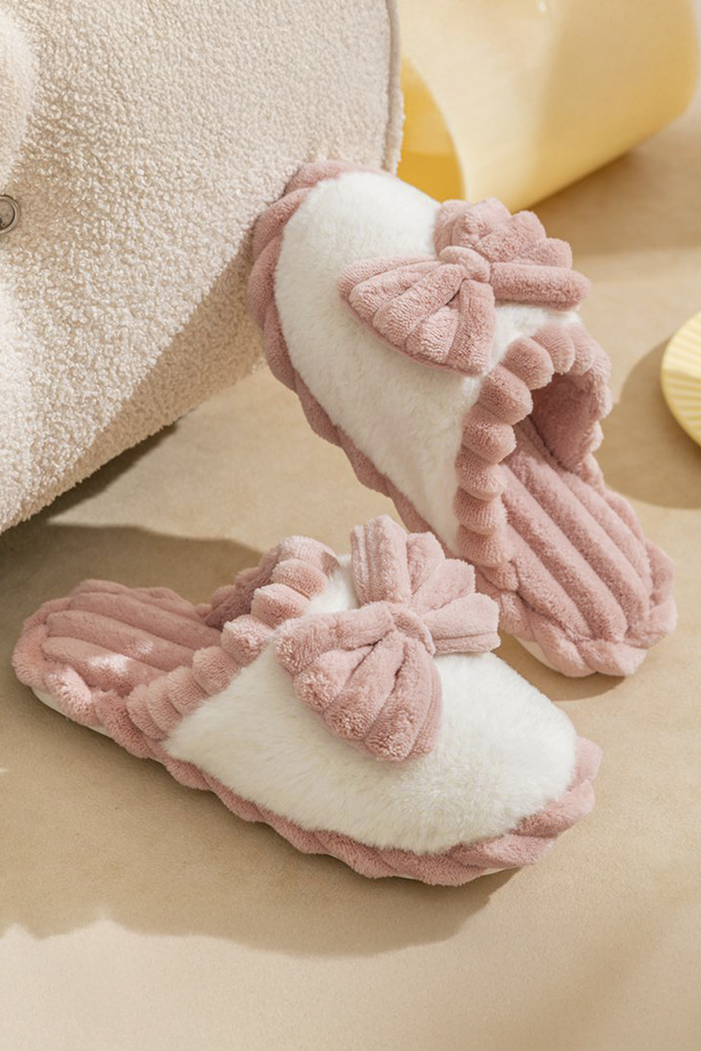 Fushia bow decor plush slippers with ribbed texture and color block design