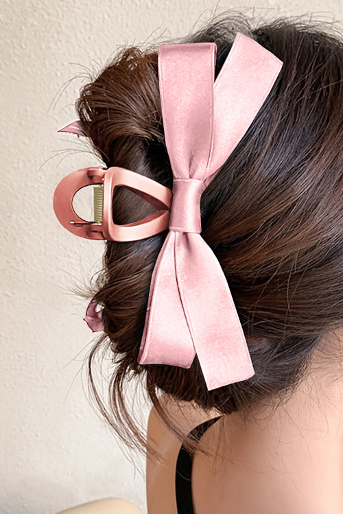 Large black bow decor hair claw clip securing hair elegantly