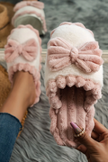 Fushia bow decor ribbed plush slippers with color block design and cozy comfort