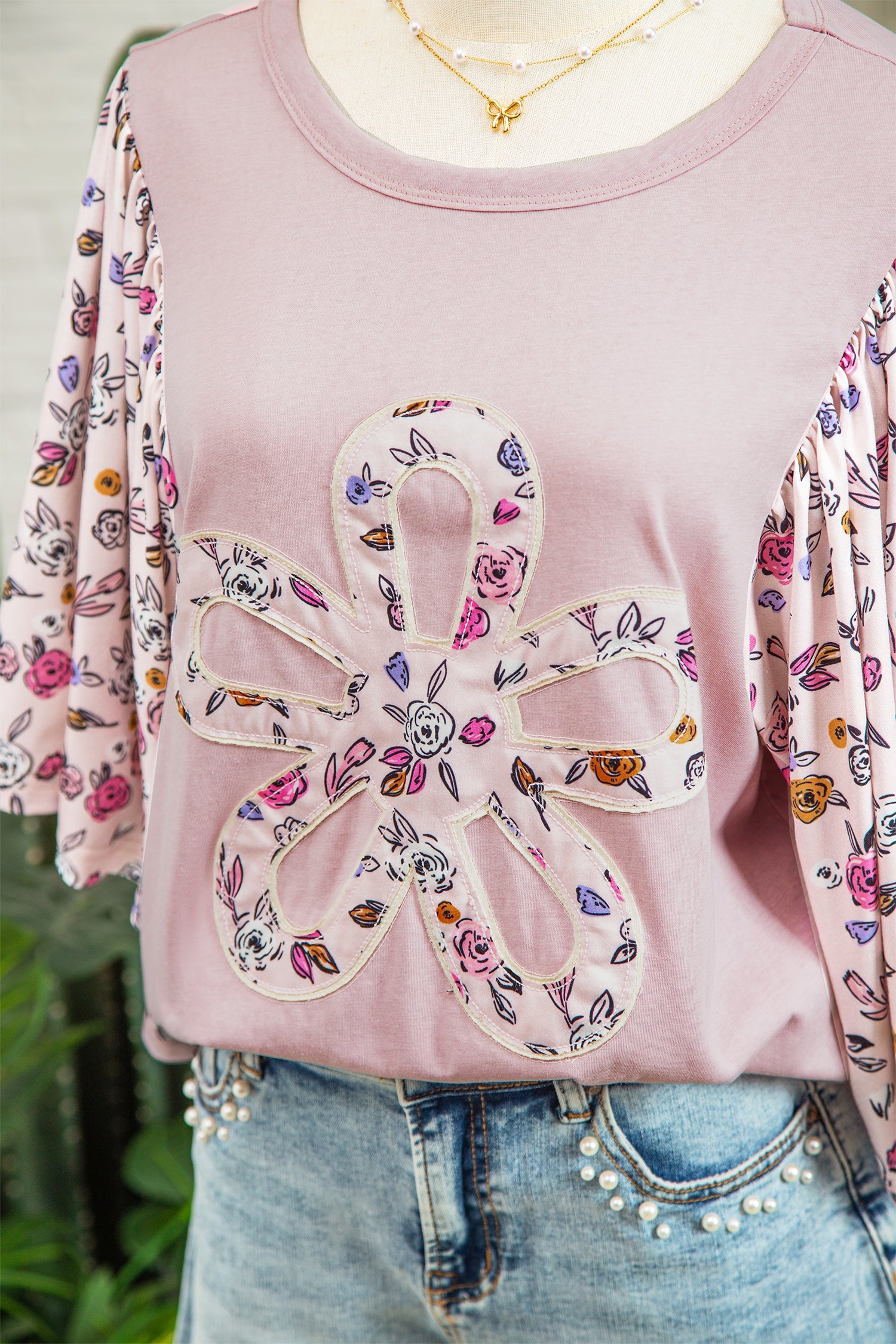 Pink blouse with floral patchwork and flowy half sleeves