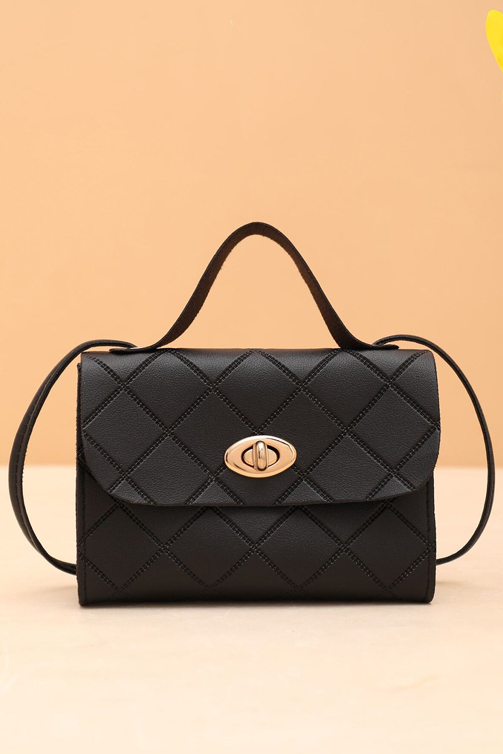 Breen PU leather small diamond-pattern messenger bag with lock and spacious interior