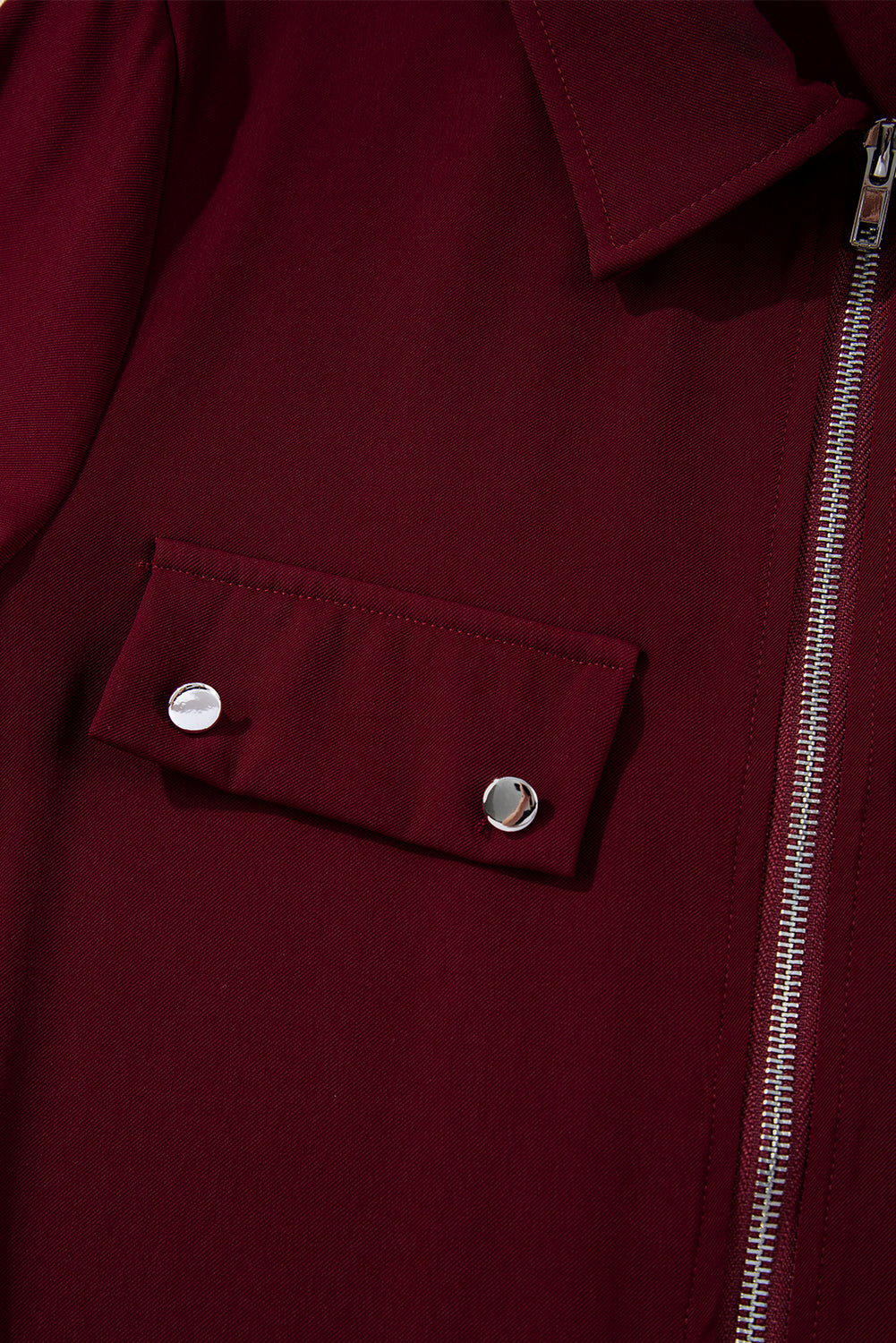 Black jacket with collar and tab sleeve zip-up flap detail