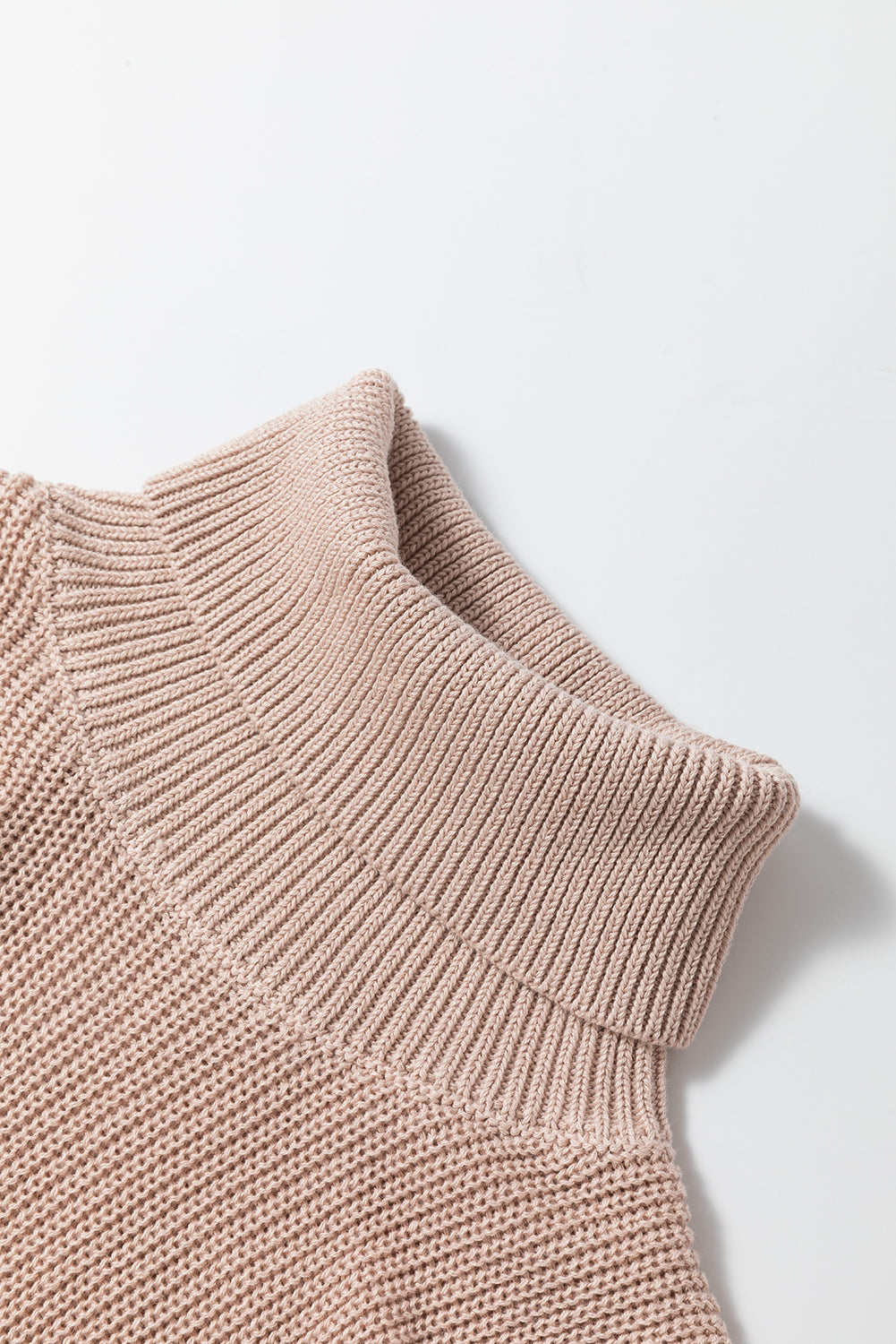 Oatmeal solid color turtleneck sleeveless knit tank top on hanger