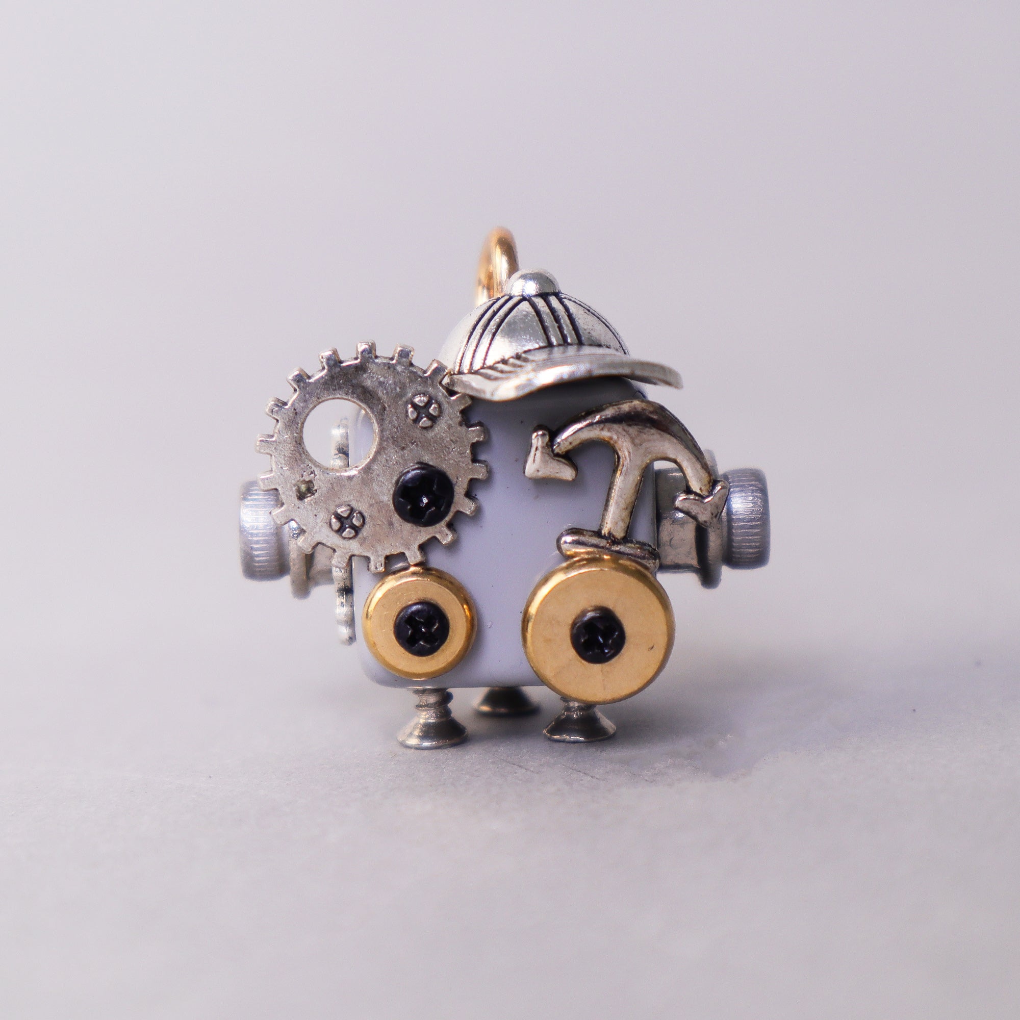 Handcrafted wooden bot necklace, keychain, and mini decor with unique character and natural wood finish