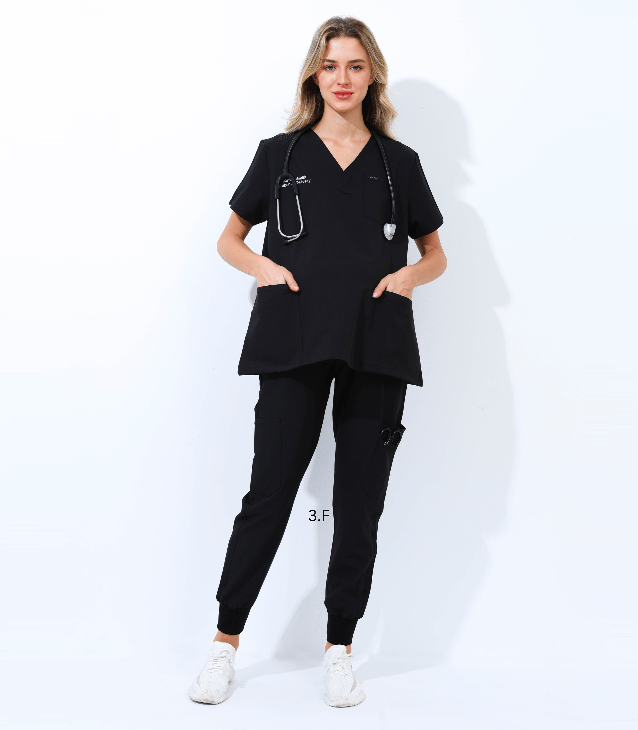 Pregnant medical professional wearing Mae Scrub Top from Maternity Scrubs Collection, stylish and comfortable maternity healthcare uniform