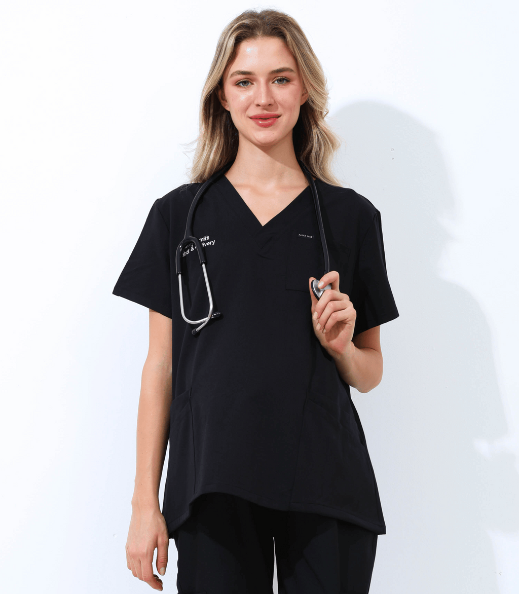 Pregnant medical professional wearing stylish and comfortable maternity scrubs from the Maternity Scrubs Collection designed for healthcare workers.