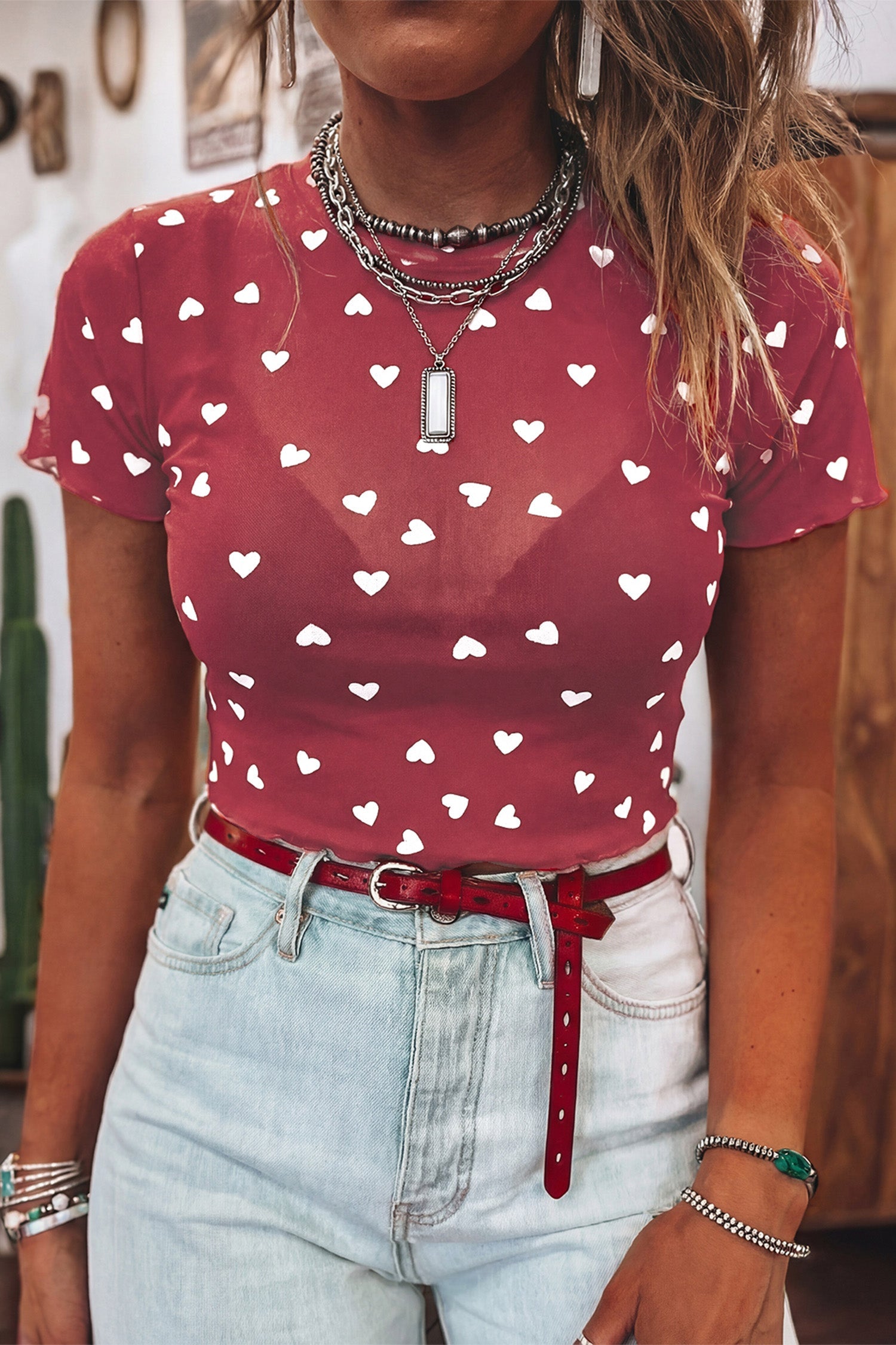 Pink mesh top with allover heart print and lettuce trim short sleeves