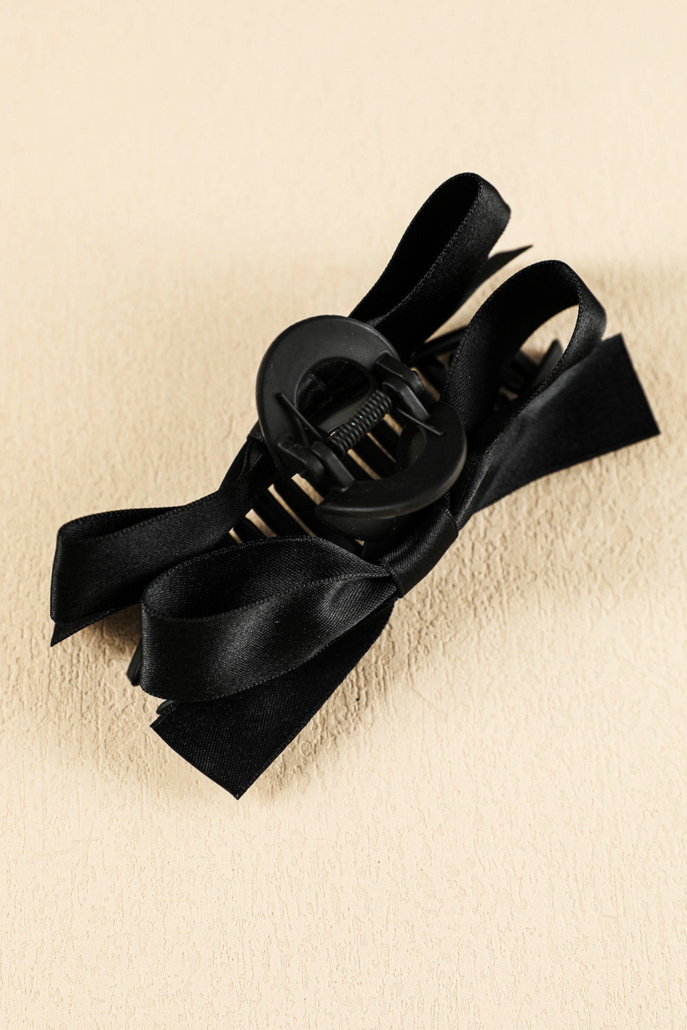Large black bow decor hair claw clip for secure elegant hairstyles