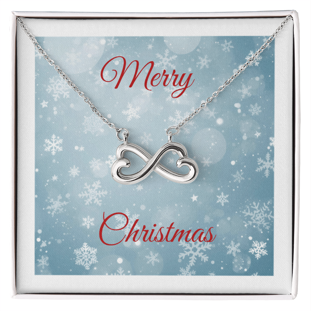 Endless Love Necklace heart-shaped infinity pendant in 14k white gold with adjustable chain in gift box with Merry Christmas background