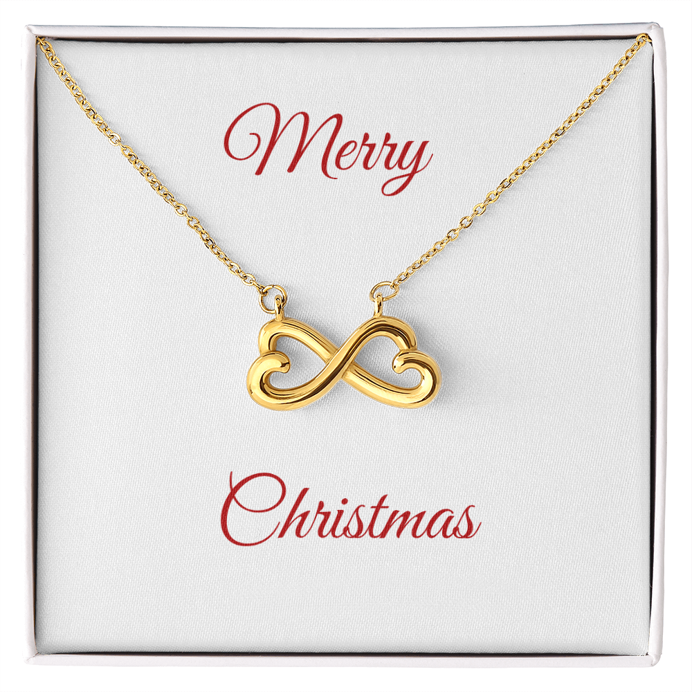 Gold Endless Love Necklace with heart-shaped infinity pendant in gift box saying Merry Christmas