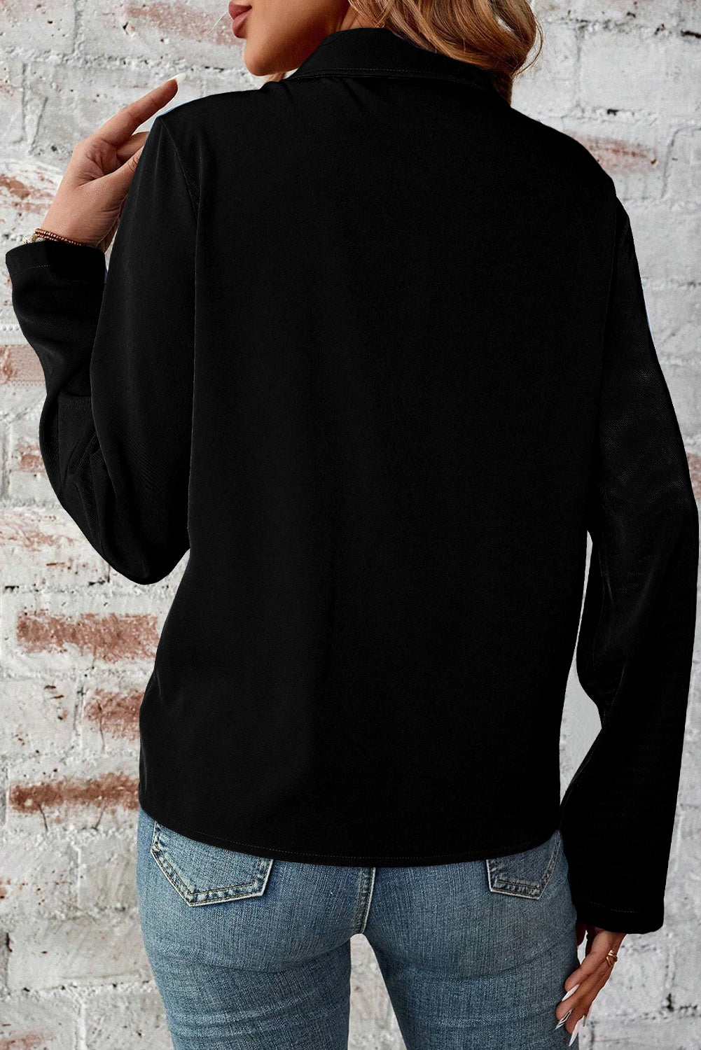 Black collar tab sleeve zip-up flap detail jacket on white background