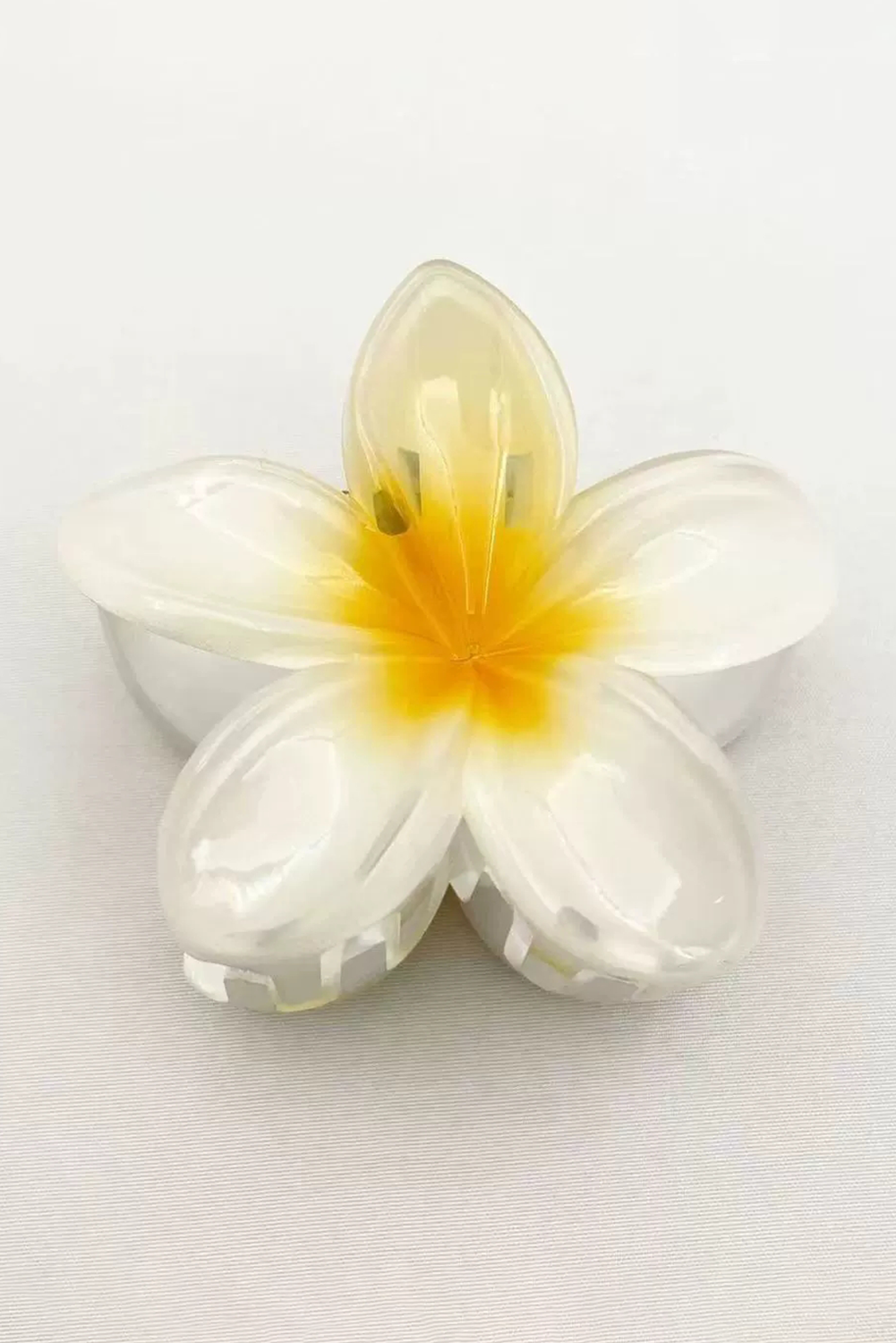 Yellow frangipani shape acrylic hair clip with tropical design and durable 8cm size