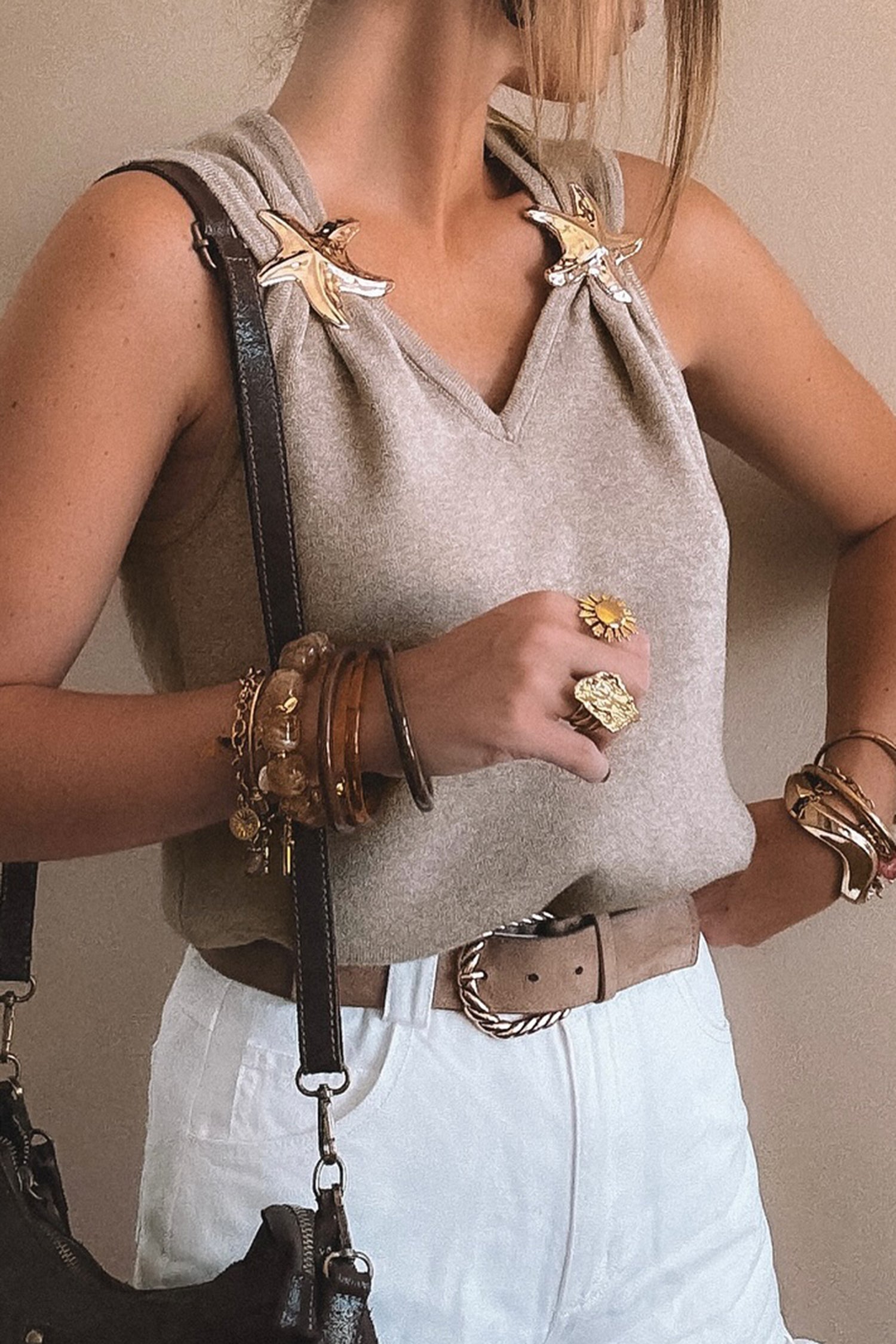 Gray sleeveless V-neck knit tank top with metallic star detail and relaxed fit