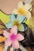 Yellow frangipani shaped acrylic hair clip with tropical design and 8cm size
