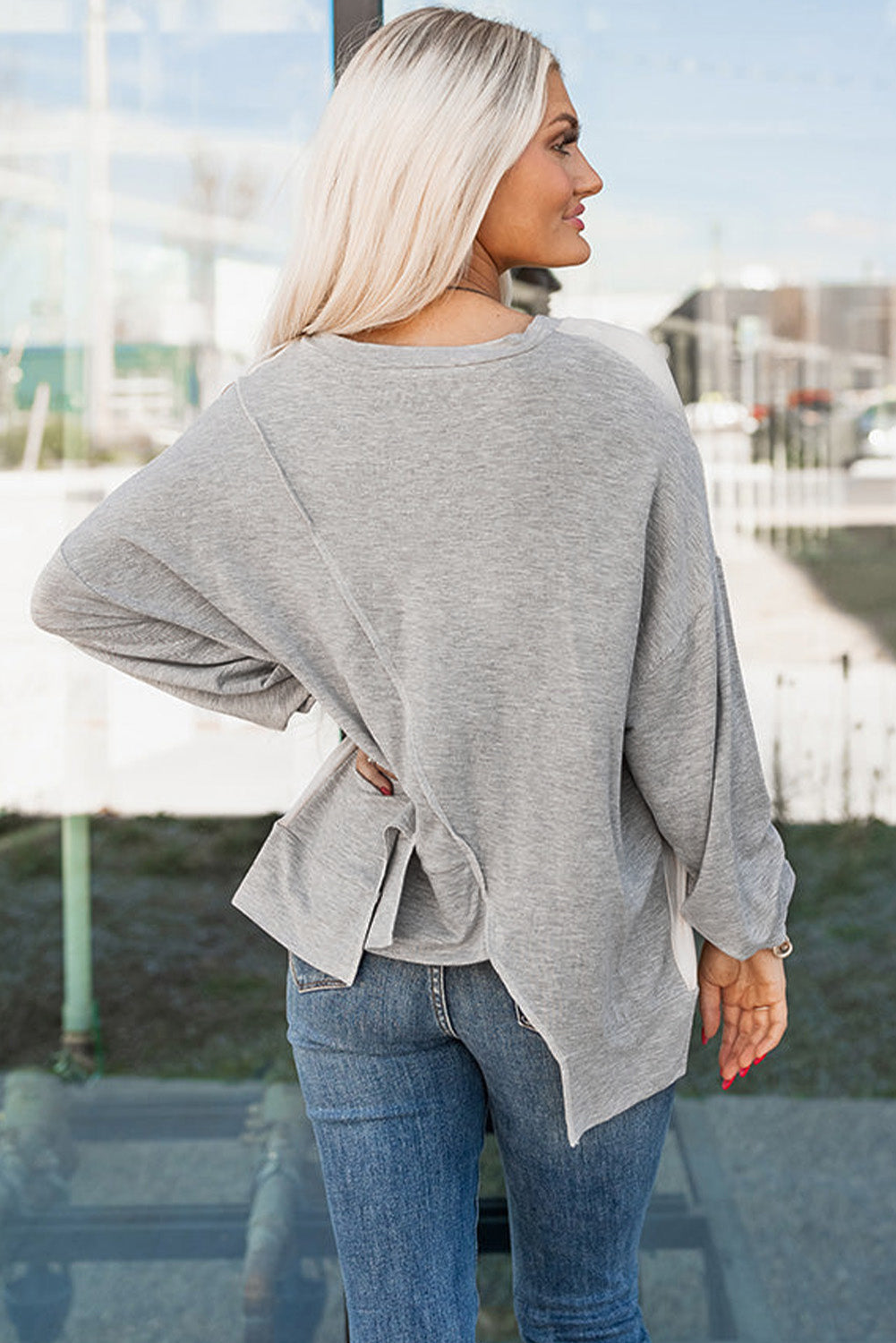 Light French Beige colorblock long sleeve top with irregular hem and patchwork stitching